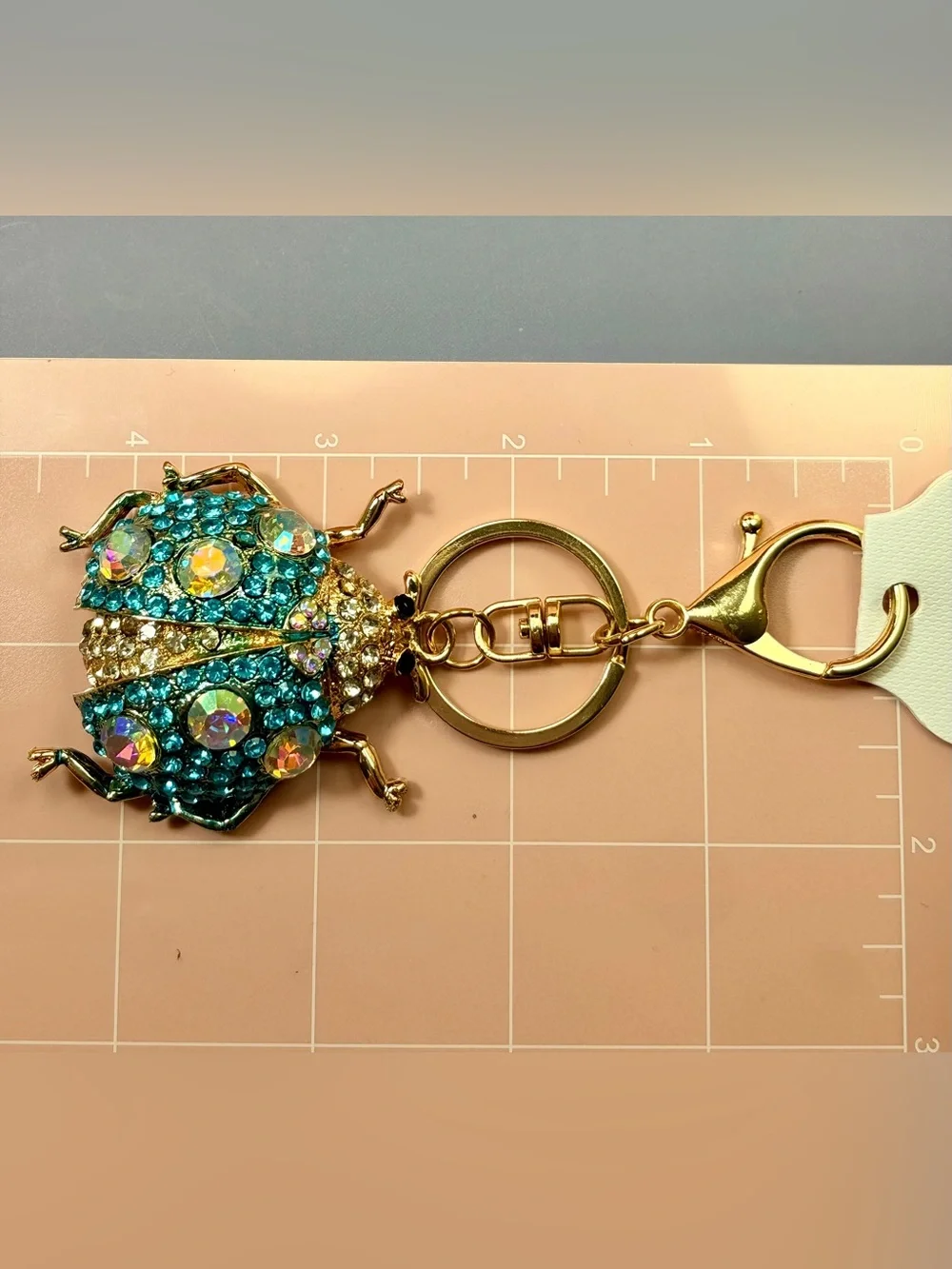 Sparkling Ladybug Keychain - Gold with Blue Aurora Rhinestones